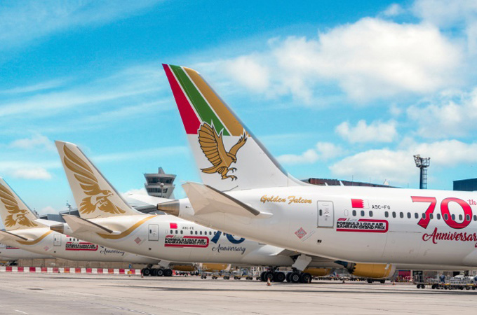 Gulf Air, Bahrain Airport Company seal landmark...