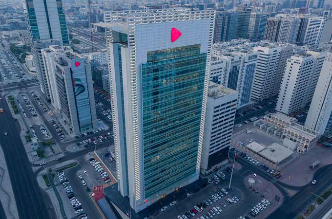 ADCB reports record H1 pre-tax profit of $2bn,...